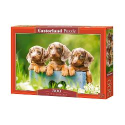 Puzzle de 500 piese cu Cute Dachshunds Puzzle-ul are 47 x 33 cm iar cutia masoara 325×225×5 cm Pentru varste de peste 9 ani