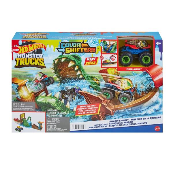 Cu setul de joc Hot Wheels® Monster Trucks Swamp Chomp™ Color Shifters™ zdrobirea si prabusirea ofera un val de surprize de schimbare a culorii pentru senzatii tari si emotii masive Lansati Color Shifters™ Piran-ahhh™ inclus si atunci cand cade in gura aligatorului plina de apa inghetata initiaza o schimbare de culoare care ofera camionului un aspect cu totul nou Relansati camionul si in timp ce zdobeste semnul cade pe o barca unde poate fi stropit cu apa 